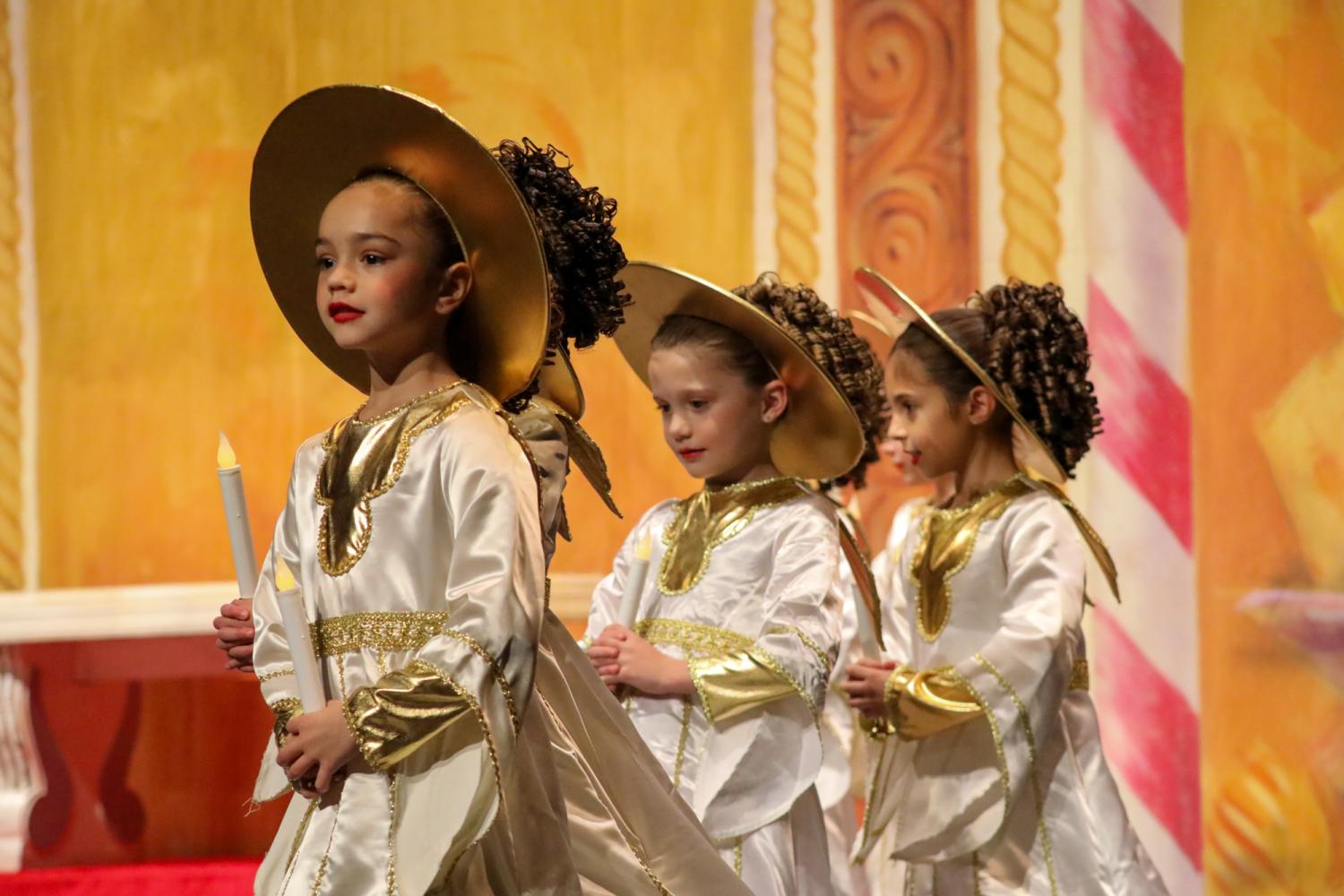 Angels holding candles