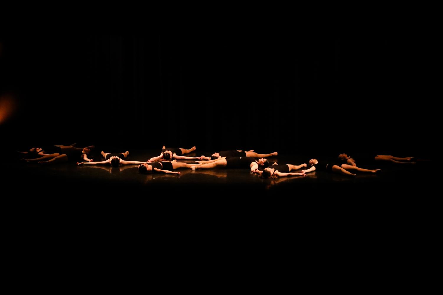 Dancers lying on the floor